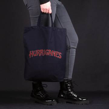 Tummansininen Hurriganes logo Kauppakassi